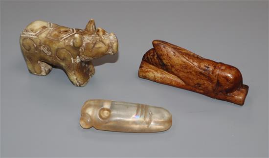 An archaistic jade carving of a cicada, a rock crystal cicada and a rhino figure tallest 5cm